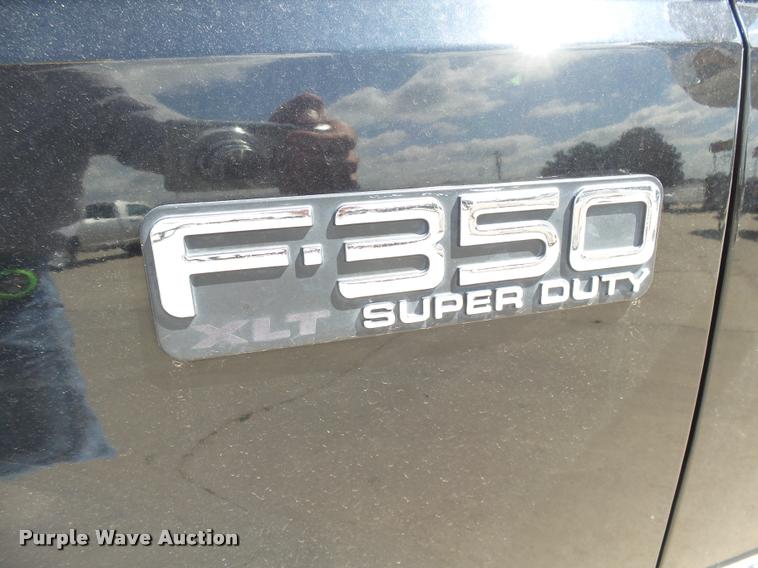 image for item DC3979 2003 Ford F350 Super Duty XLT Lariat Edge Crew Cab flatbed pickup truck