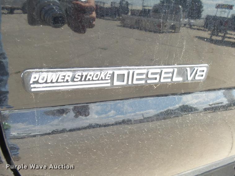 image for item DC3979 2003 Ford F350 Super Duty XLT Lariat Edge Crew Cab flatbed pickup truck