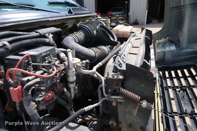 image for item DD1682 2004 GMC C5C042 flatbed truck