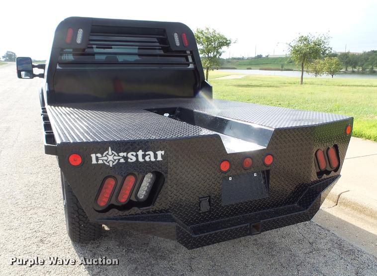 image for item DL9032 2014 Ford F250 Super Duty SuperCab flatbed pickup truck