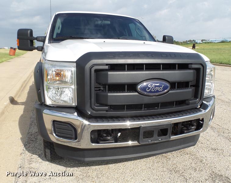 image for item DL9032 2014 Ford F250 Super Duty SuperCab flatbed pickup truck