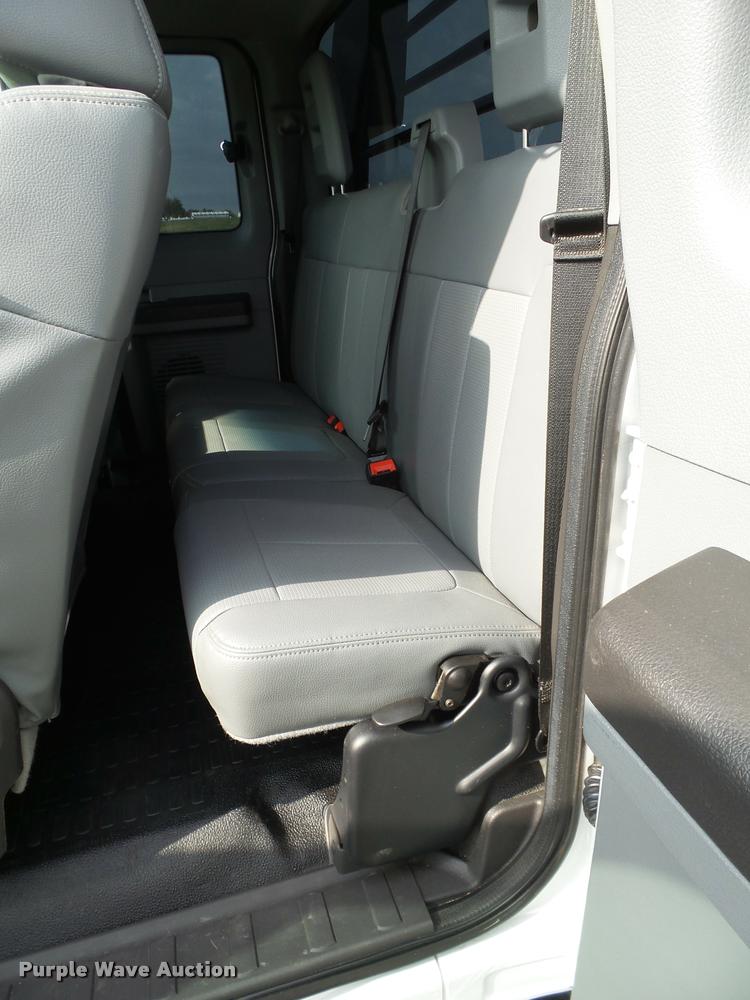 image for item DL9032 2014 Ford F250 Super Duty SuperCab flatbed pickup truck