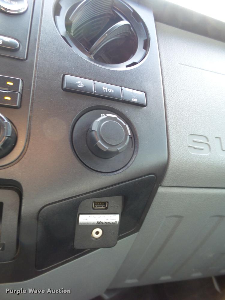 image for item DL9032 2014 Ford F250 Super Duty SuperCab flatbed pickup truck