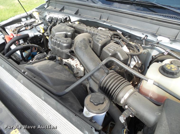 image for item DL9032 2014 Ford F250 Super Duty SuperCab flatbed pickup truck