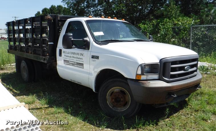 image for item K5893 2004 Ford F350 Super Duty flatbed pickup truck