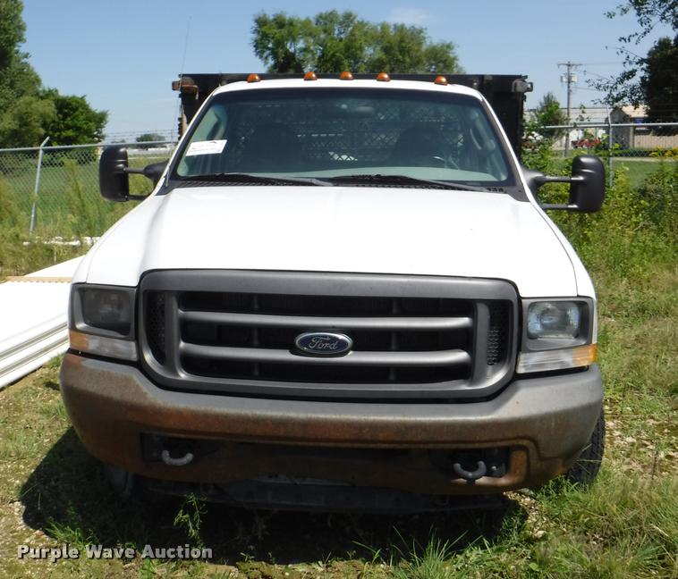 image for item K5893 2004 Ford F350 Super Duty flatbed pickup truck