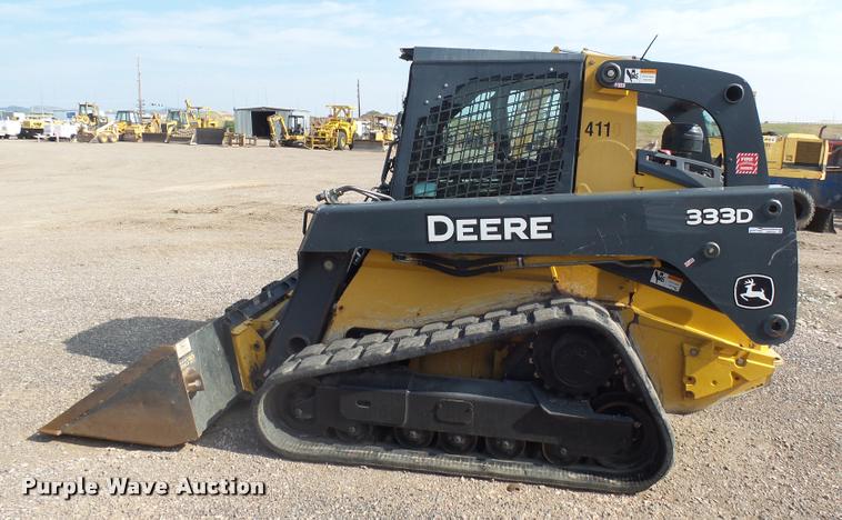 image for item DH9703 2011 John Deere 333D skid steer