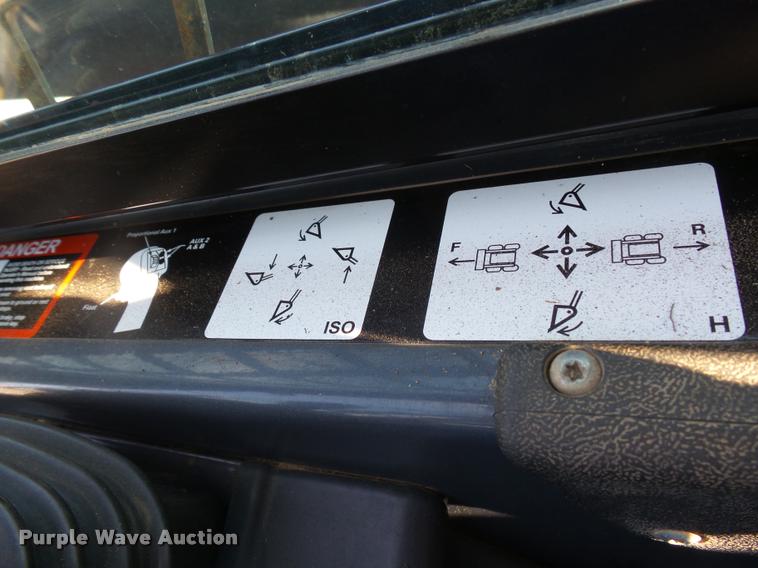 image for item DH9703 2011 John Deere 333D skid steer