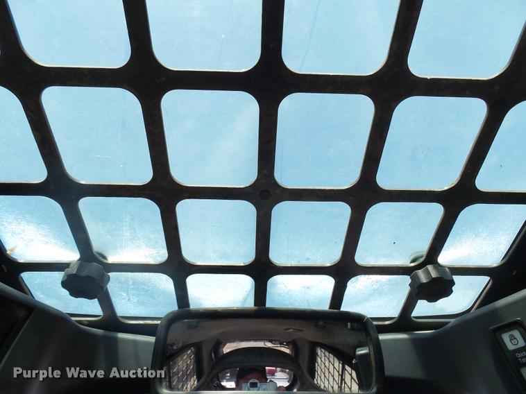 image for item DH9703 2011 John Deere 333D skid steer