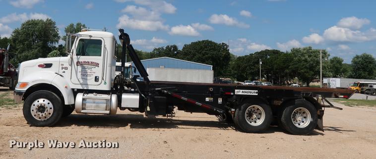 image for item K1824 2011 Peterbilt 348 roll off container truck