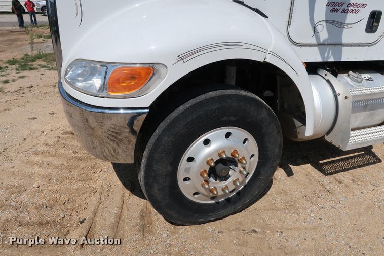 image for item K1824 2011 Peterbilt 348 roll off container truck