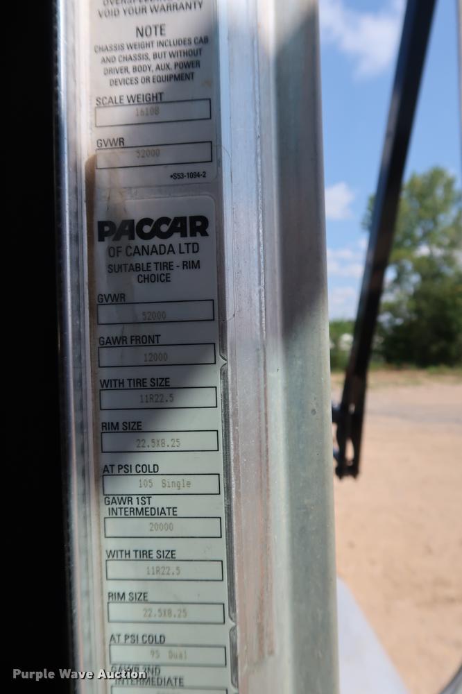 image for item K1824 2011 Peterbilt 348 roll off container truck