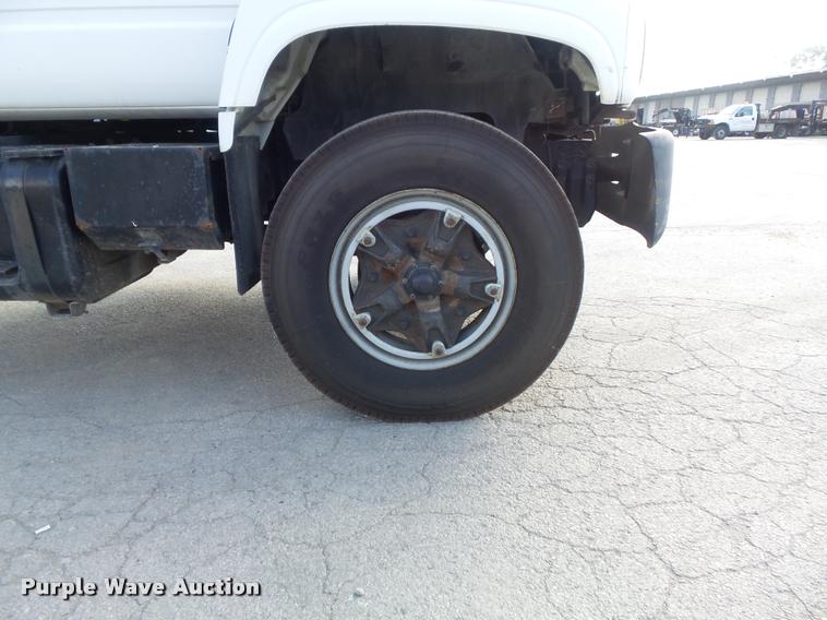 image for item K7502 1997 Chevrolet C7500 roll back truck