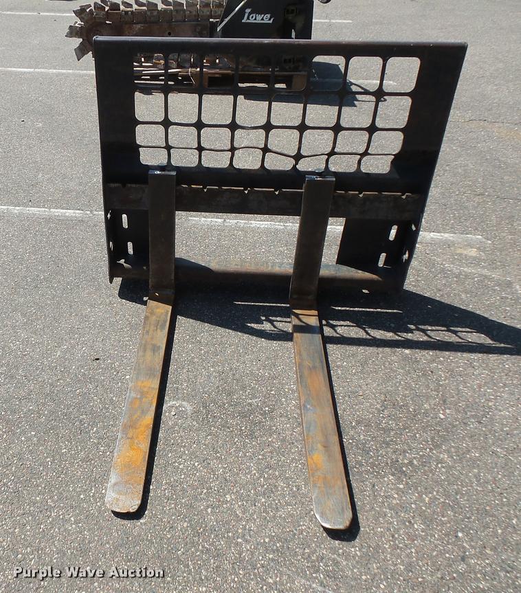 Bobcat pallet forks in Burnsville, MN Item DB8204 sold Purple Wave