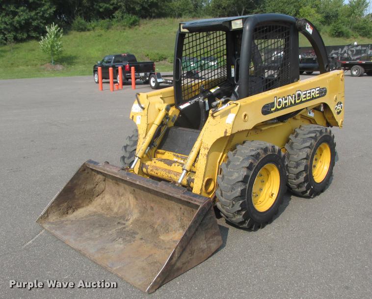 image for item K6116 2002 John Deere 250 skid steer