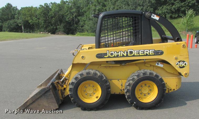 image for item K6116 2002 John Deere 250 skid steer
