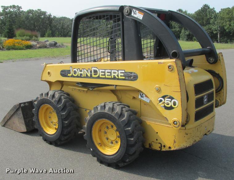 image for item K6116 2002 John Deere 250 skid steer