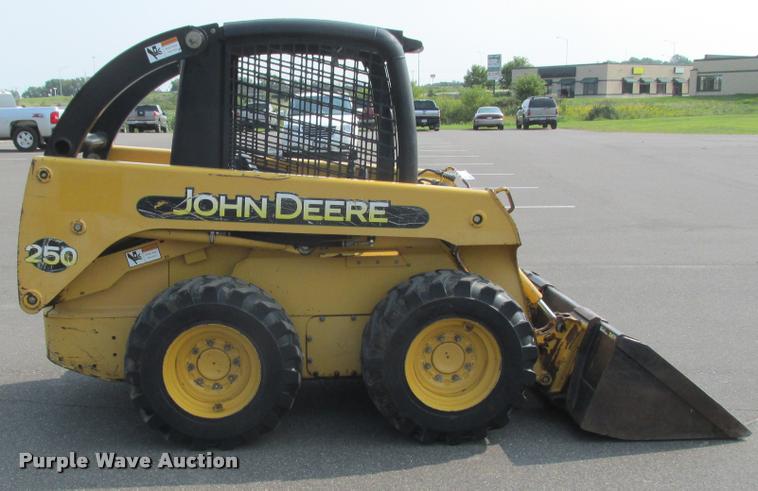 image for item K6116 2002 John Deere 250 skid steer