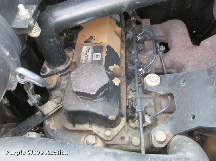 image for item K6116 2002 John Deere 250 skid steer