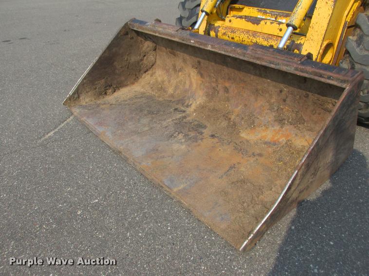 image for item K6116 2002 John Deere 250 skid steer