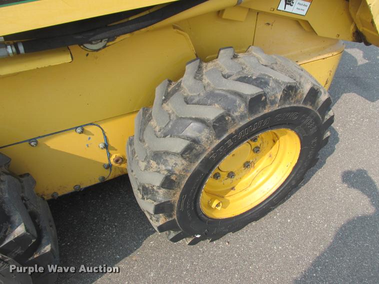 image for item K6116 2002 John Deere 250 skid steer