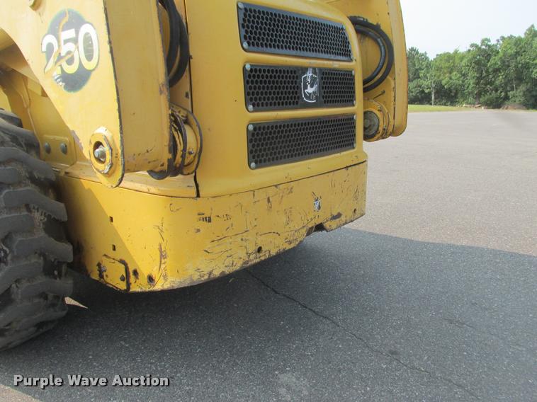 image for item K6116 2002 John Deere 250 skid steer