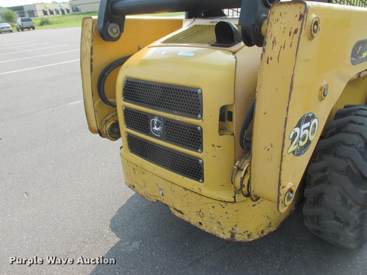 image for item K6116 2002 John Deere 250 skid steer