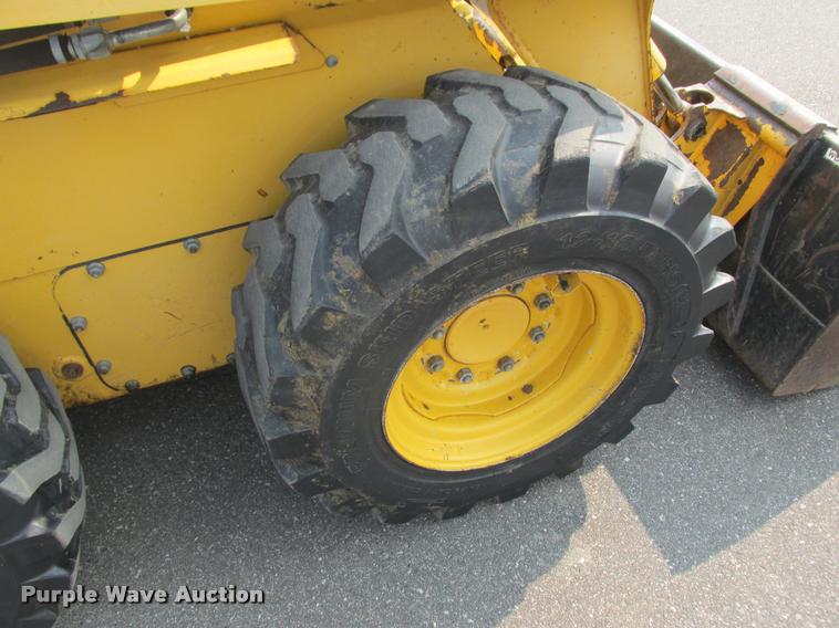 image for item K6116 2002 John Deere 250 skid steer