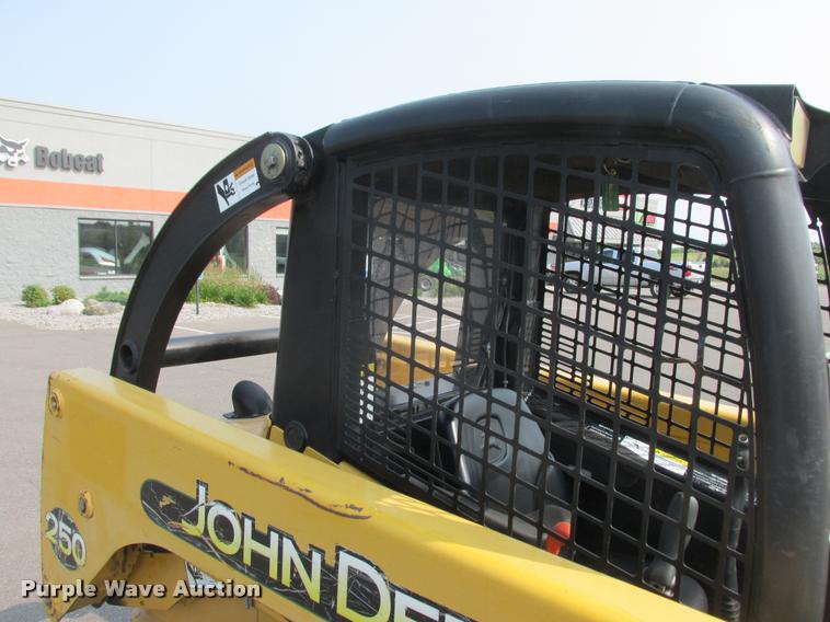 image for item K6116 2002 John Deere 250 skid steer