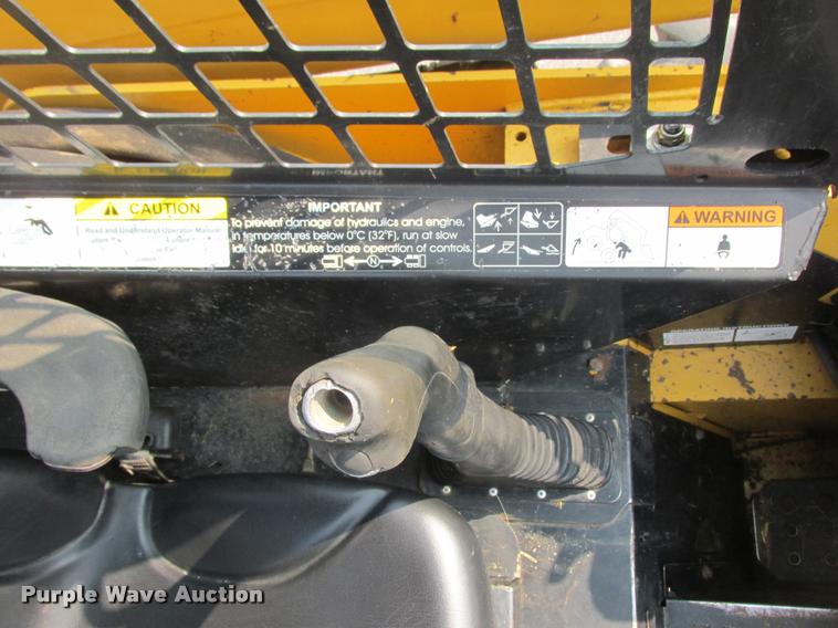 image for item K6116 2002 John Deere 250 skid steer