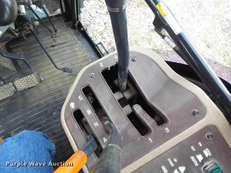 image for item DB5864 Branson 6530 MFWD tractor