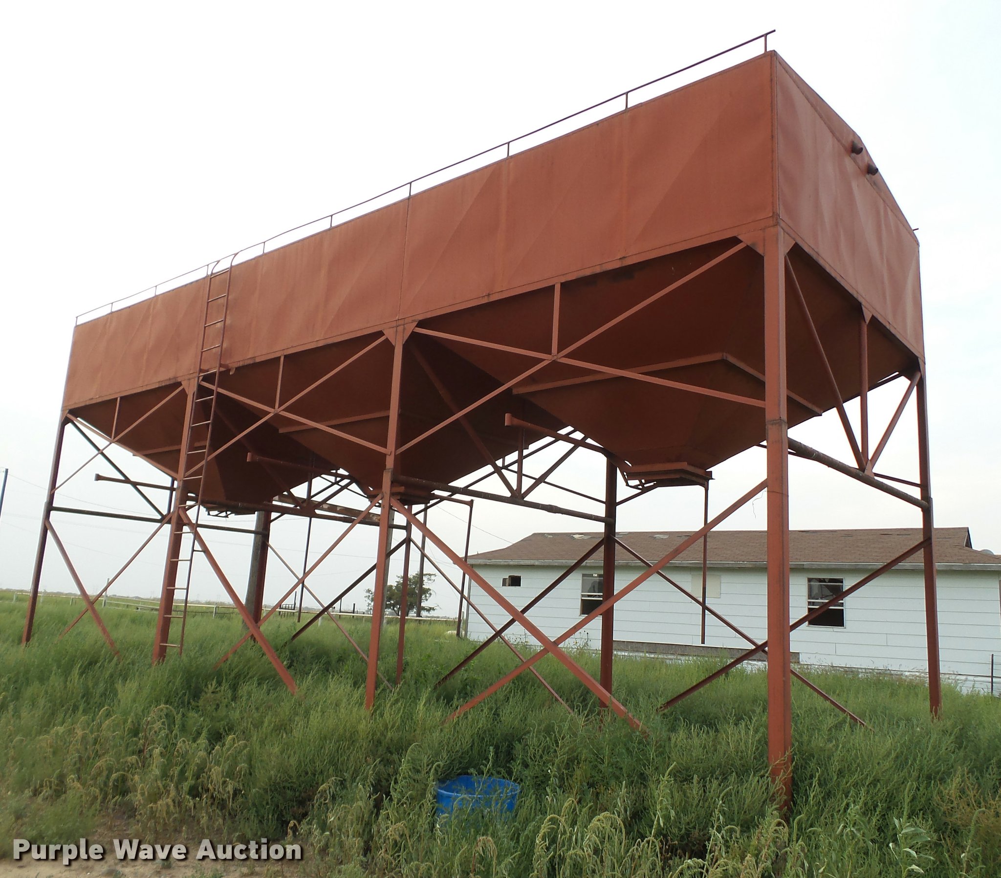 Overhead triple hopper feed bin in Channing, TX Item DL9010 sold