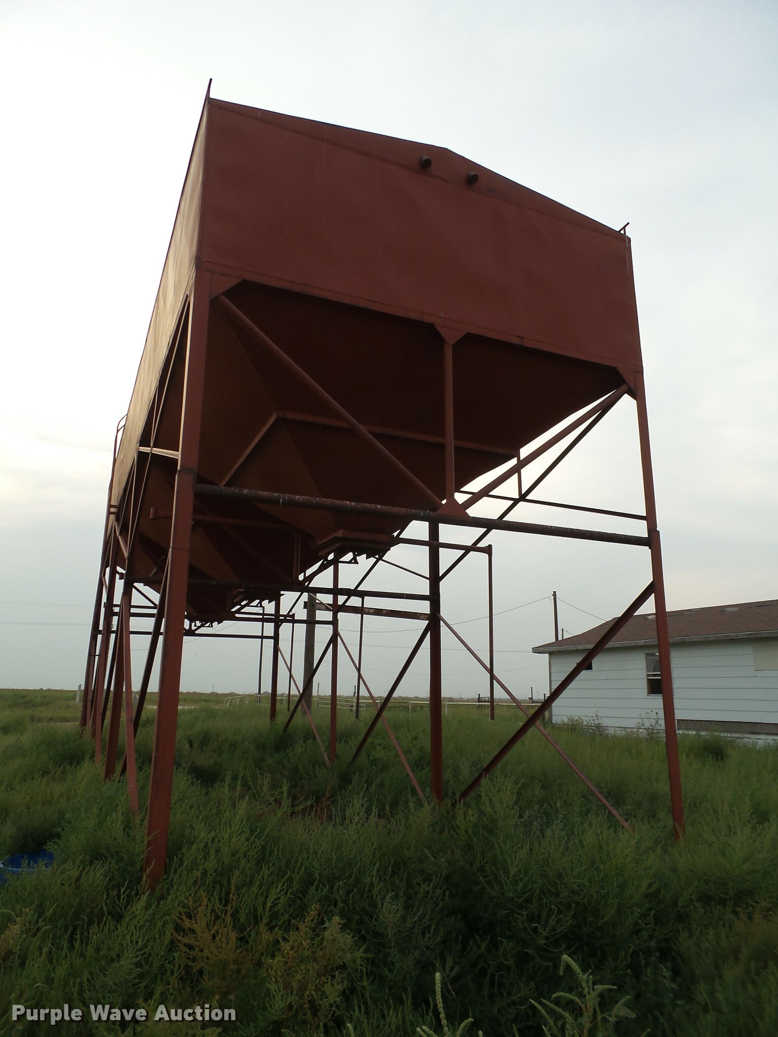 Overhead triple hopper feed bin in Channing, TX Item DL9010 sold