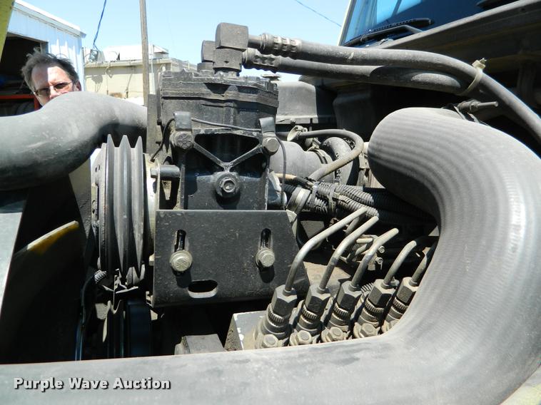 image for item DB1128 1994 Freightliner FL80 refuse truck