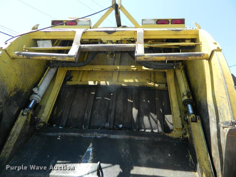 image for item DB1128 1994 Freightliner FL80 refuse truck