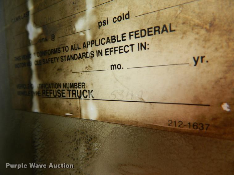 image for item DB1128 1994 Freightliner FL80 refuse truck