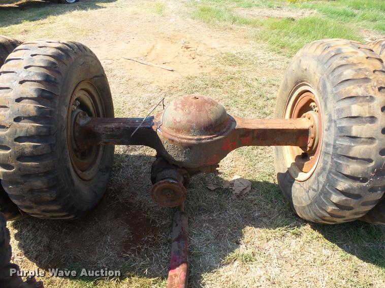 image for item DB4154 Rockwell Standard five ton axle/tire/wheel set