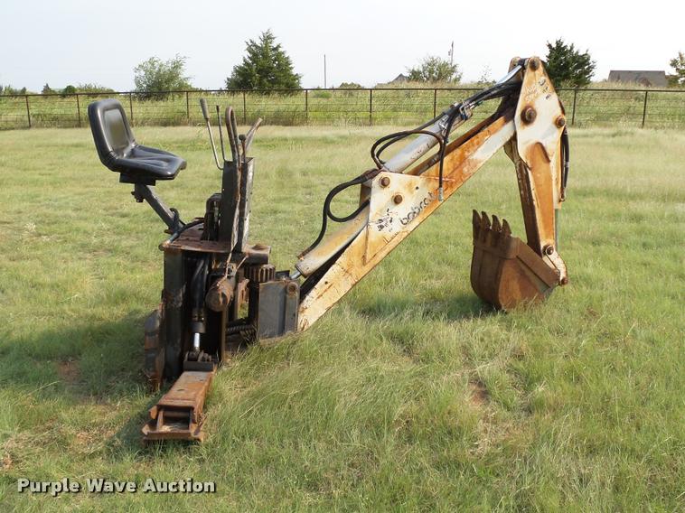 image for item DB4159 Melroe Bobcat 911 backhoe attachment