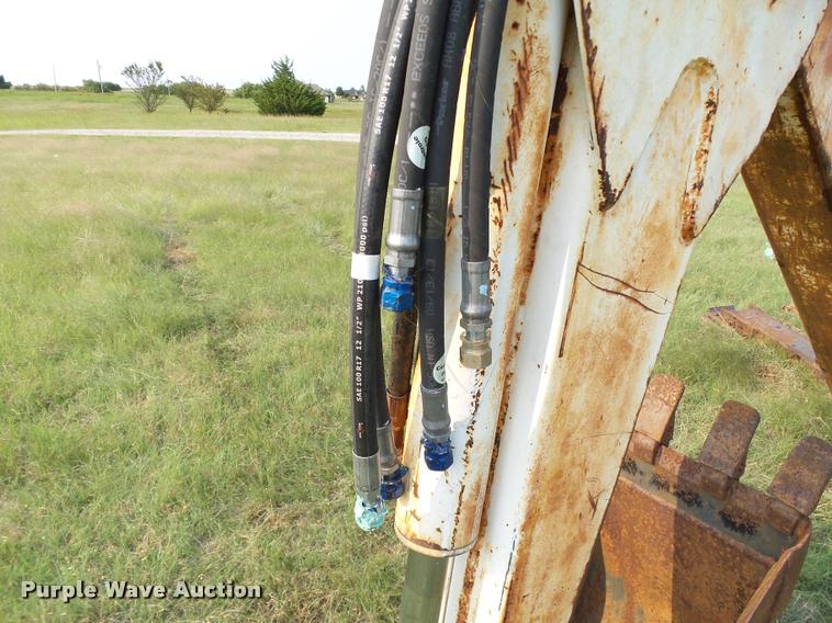 image for item DB4159 Melroe Bobcat 911 backhoe attachment