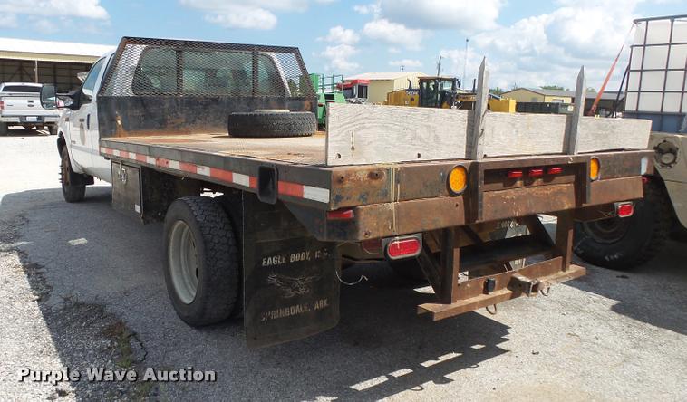 image for item DB7414 2003 Ford F550 Crew Cab flatbed truck