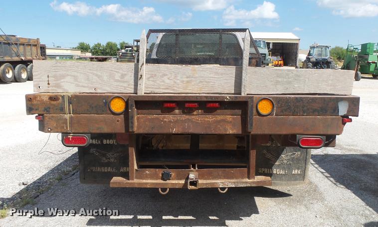 image for item DB7414 2003 Ford F550 Crew Cab flatbed truck