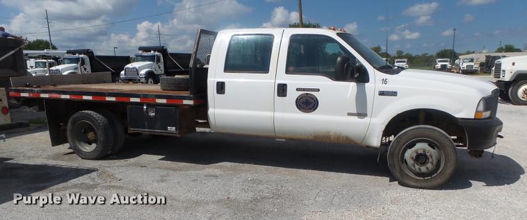 image for item DB7414 2003 Ford F550 Crew Cab flatbed truck