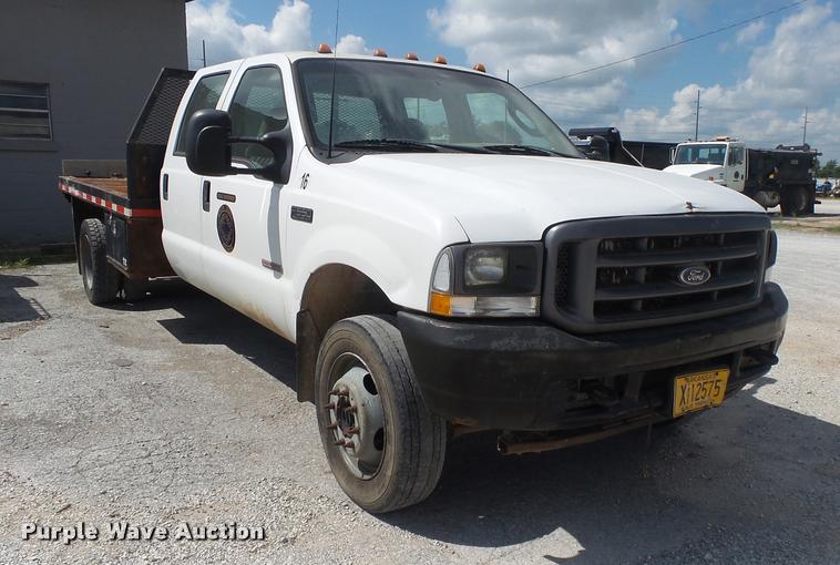 image for item DB7414 2003 Ford F550 Crew Cab flatbed truck