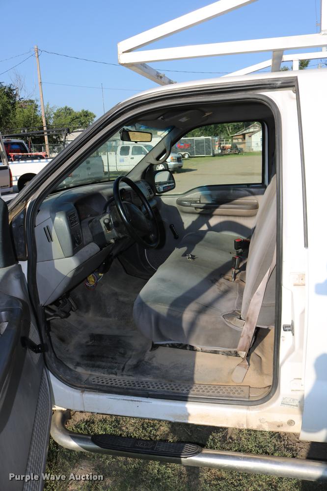 image for item DD0196 1999 Ford F350 Super Duty Crew Cab flatbed pickup truck