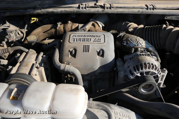 image for item DD0196 1999 Ford F350 Super Duty Crew Cab flatbed pickup truck