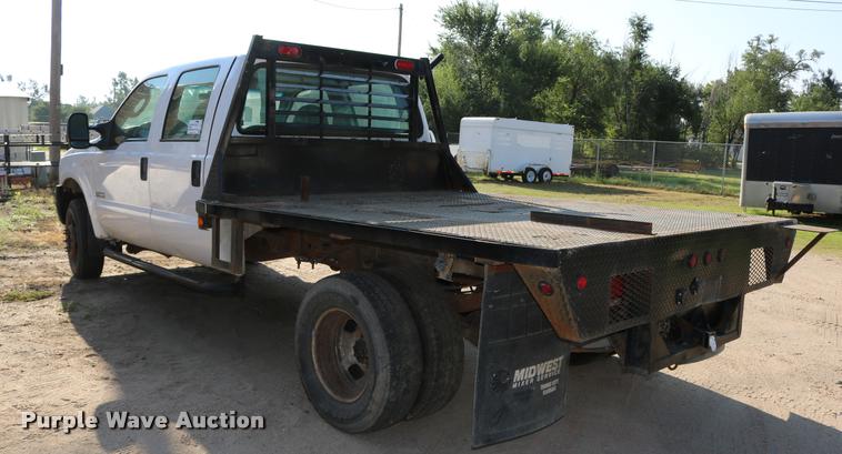 image for item DD0198 2006 Ford F350 Super Duty Crew Cab flatbed pickup truck