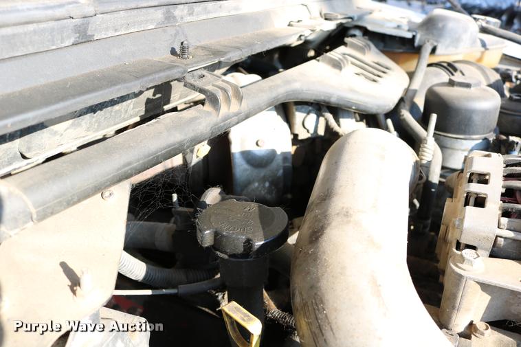 image for item DD0198 2006 Ford F350 Super Duty Crew Cab flatbed pickup truck