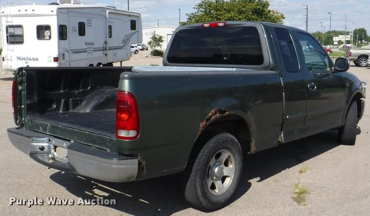 image for item DD0856 2002 Ford F150 XLT SuperCab pickup truck