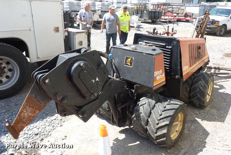 image for item DD1588 Ditch Witch 410SX cable plow