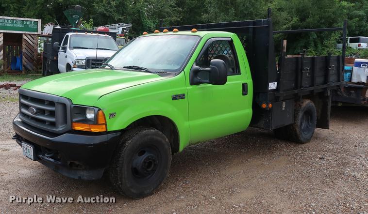 image for item DD1674 2001 Ford F350 Super Duty flatbed pickup truck